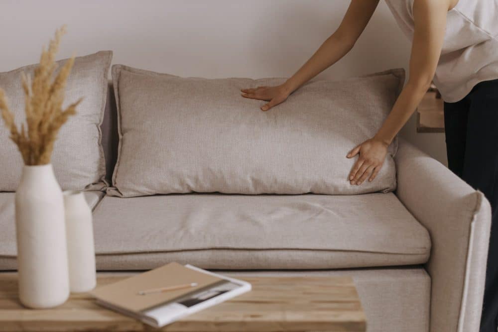 Interior view of a sofa for Goddard Point Hope charleston sc apartments pexels-cottonbro-studio-7407947-1