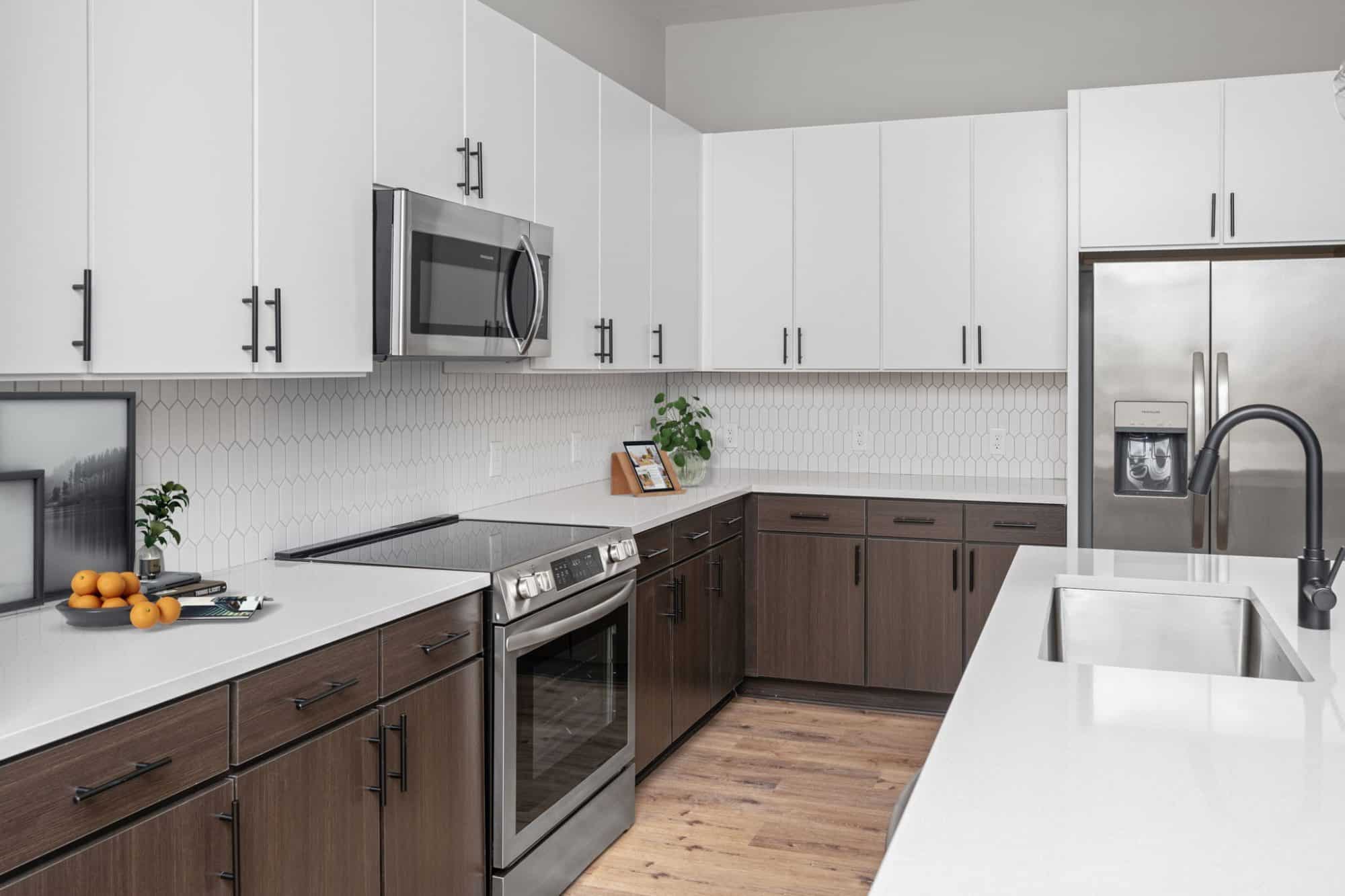 virtually staged apartment kitchen with stainless steel appliances