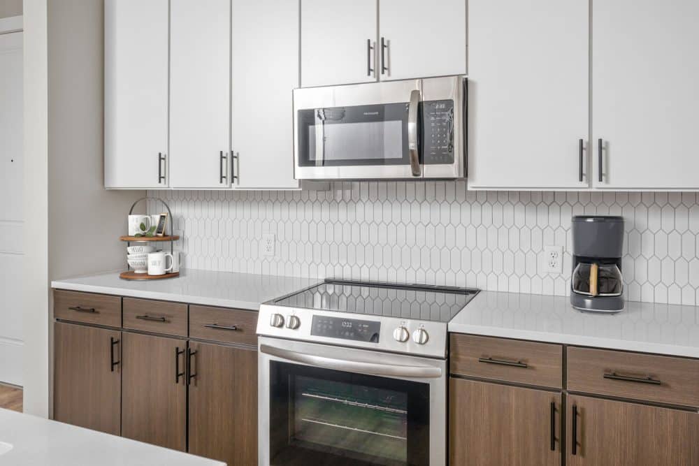 virtually staged apartment kitchen with stainless steel appliances
